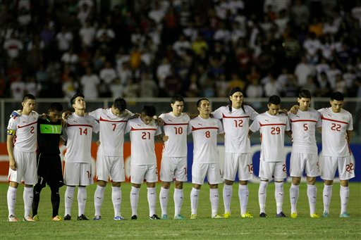 Members of the Philippine Azkal Team line up in their match against the Thai War Elephants for Suzuki Cup 2014 , December 6 (Photo by: Associated Press) 